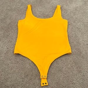 NWOT neon orange bodysuit - large